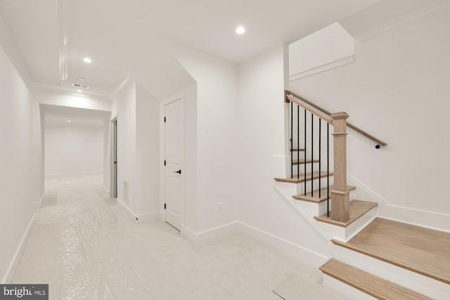 stairway featuring recessed lighting, visible vents, crown molding, and baseboards