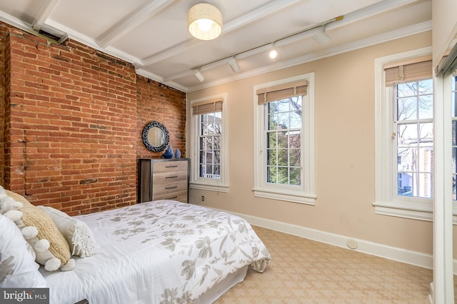 bedroom with brick wall