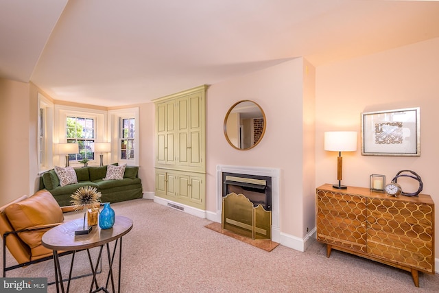 living room with light colored carpet