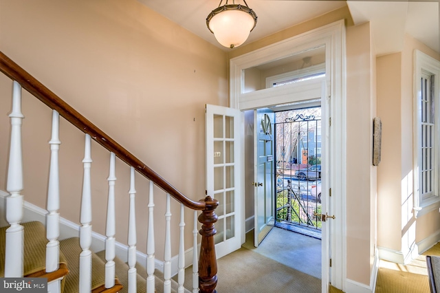 entryway with light carpet