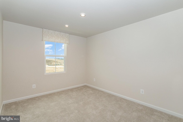 view of carpeted spare room