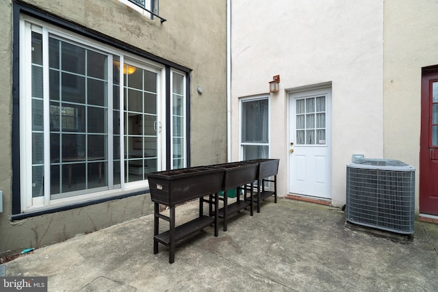 view of patio with cooling unit