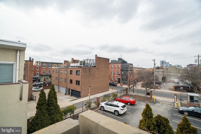 view of property with uncovered parking