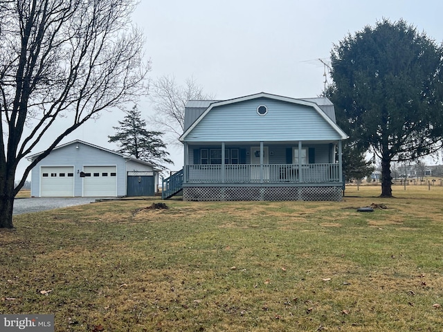 30 Foggy Bottom Ln, Berkeley Springs, WV 25411 - view of front of property with a garage, an outdoor structure, covered porch, and a front yard