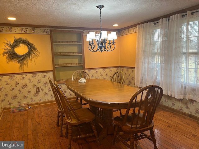 30 Foggy Bottom Ln, Berkeley Springs, WV 25411 - dining room featuring wood-type flooring, a chandelier, and a textured ceiling