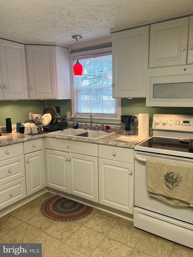 30 Foggy Bottom Ln, Berkeley Springs, WV 25411 - kitchen with sink, white appliances, white cabinetry, a textured ceiling, and decorative light fixtures