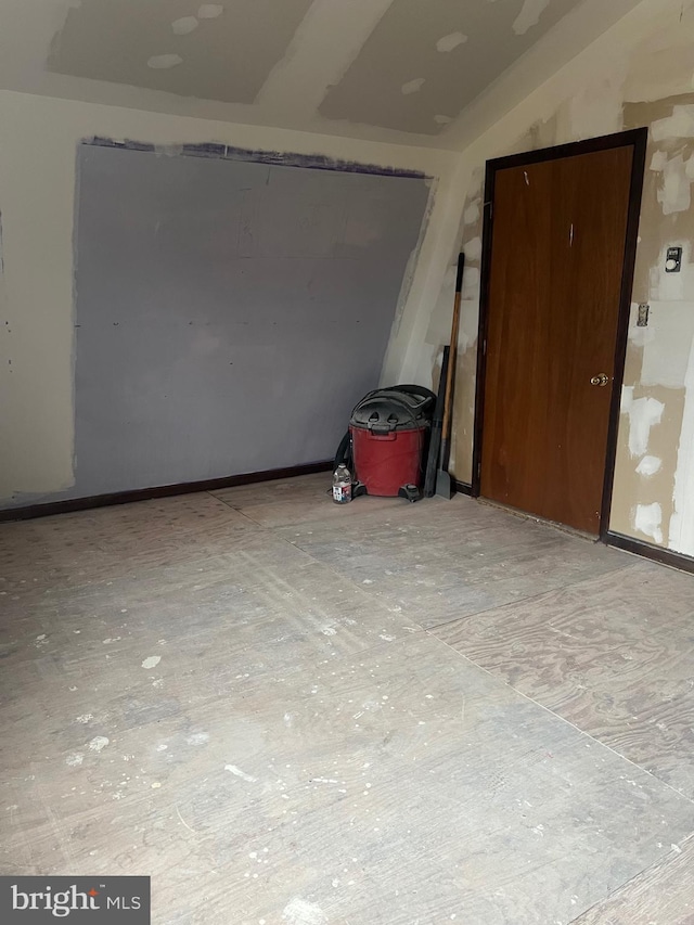 30 Foggy Bottom Ln, Berkeley Springs, WV 25411 - empty room with lofted ceiling