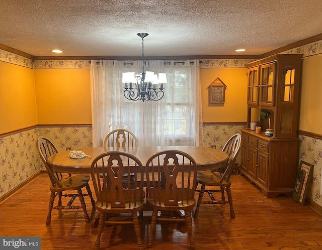 30 Foggy Bottom Ln, Berkeley Springs, WV 25411 - dining area featuring hardwood / wood-style flooring, a chandelier, and a textured ceiling