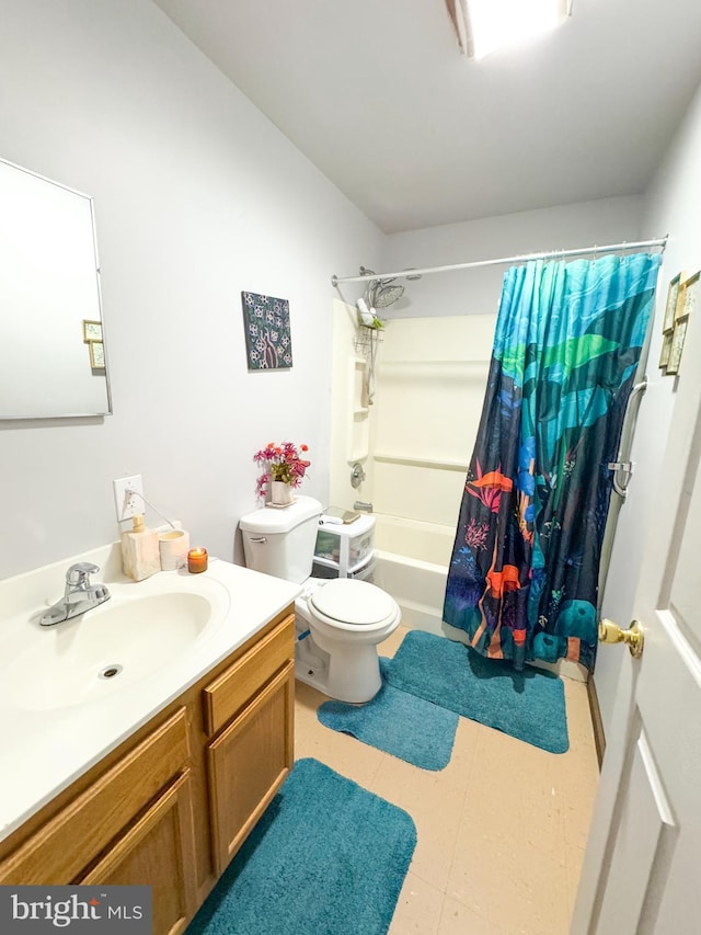 full bathroom with vanity, toilet, and shower / tub combo