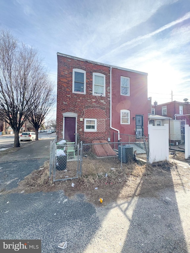 view of front of property featuring central AC unit