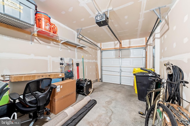 garage featuring a garage door opener