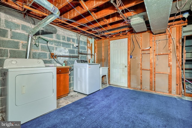 basement with washer and clothes dryer