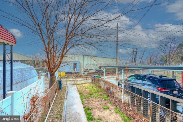 view of yard with a carport