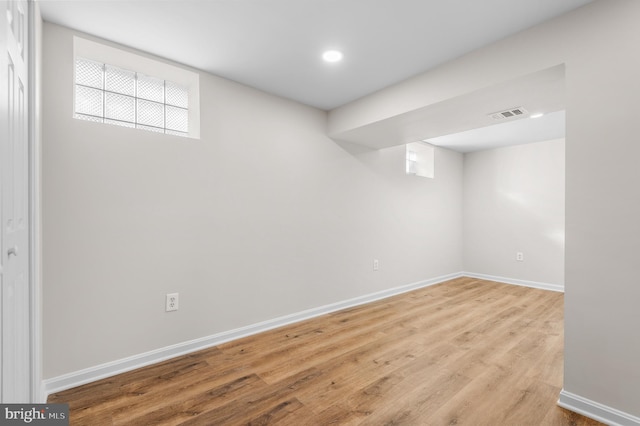 basement with light wood-type flooring