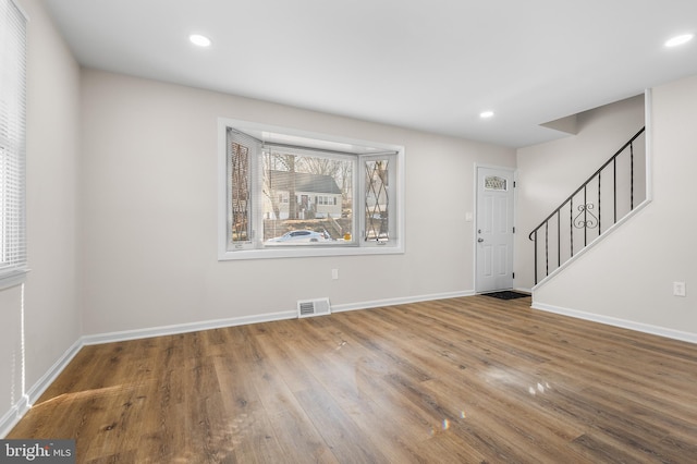 entrance foyer with wood-type flooring