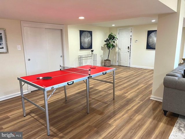 recreation room with recessed lighting, baseboards, and wood finished floors