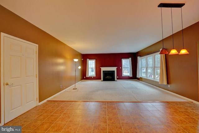 unfurnished living room with tile patterned flooring