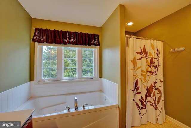 bathroom with a tub to relax in