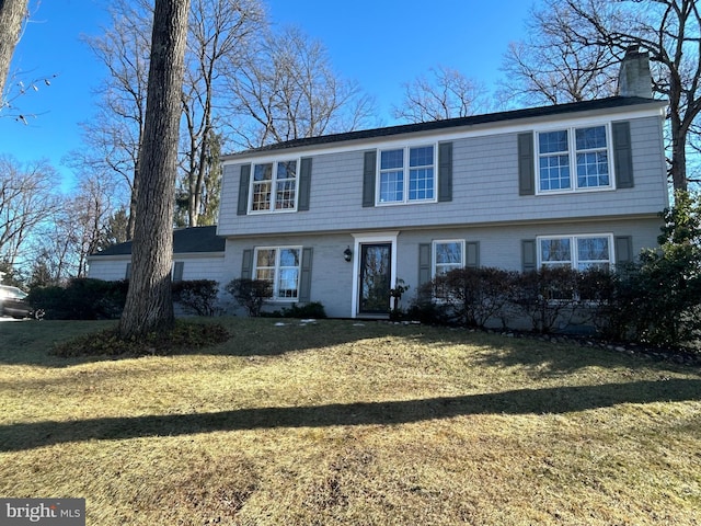 view of front of home with a front yard