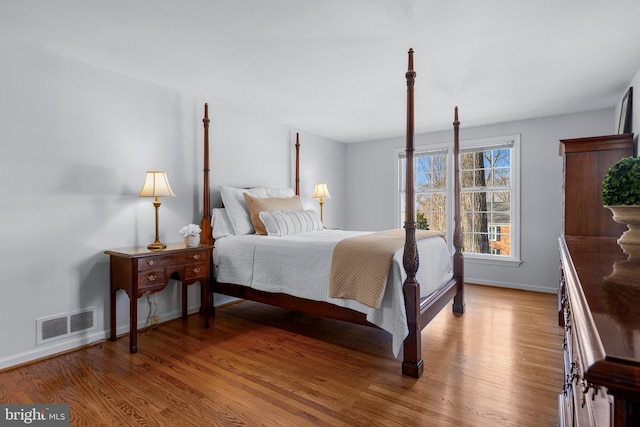 bedroom featuring hardwood / wood-style floors