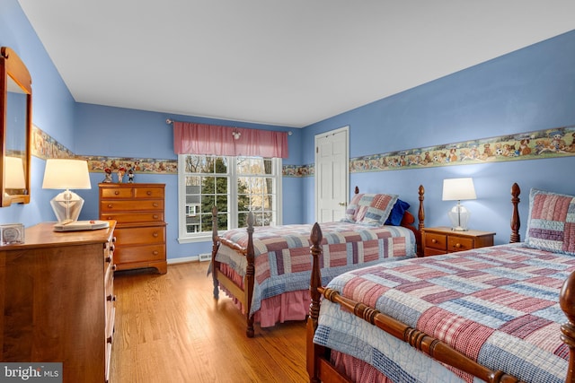 bedroom featuring light hardwood / wood-style floors