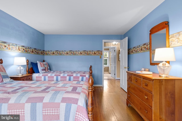 bedroom featuring light wood-type flooring