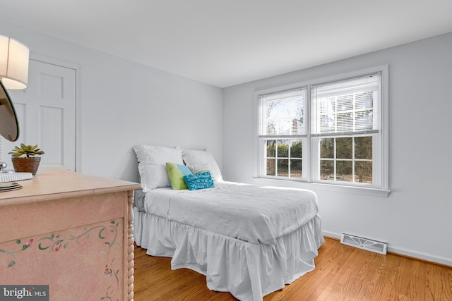 bedroom featuring light wood-type flooring