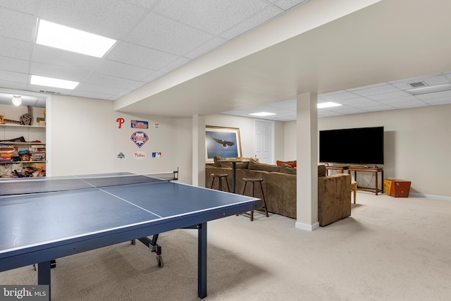 game room featuring a paneled ceiling and carpet floors