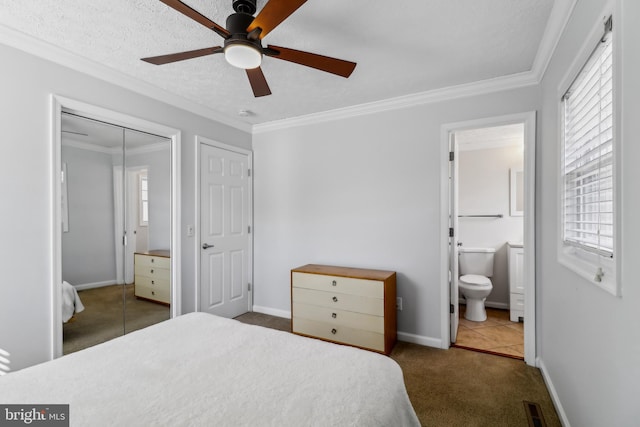 bedroom featuring carpet flooring, crown molding, a textured ceiling, and baseboards