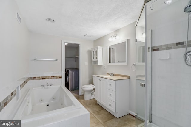 full bath featuring a textured ceiling, visible vents, vanity, a shower stall, and a whirlpool tub