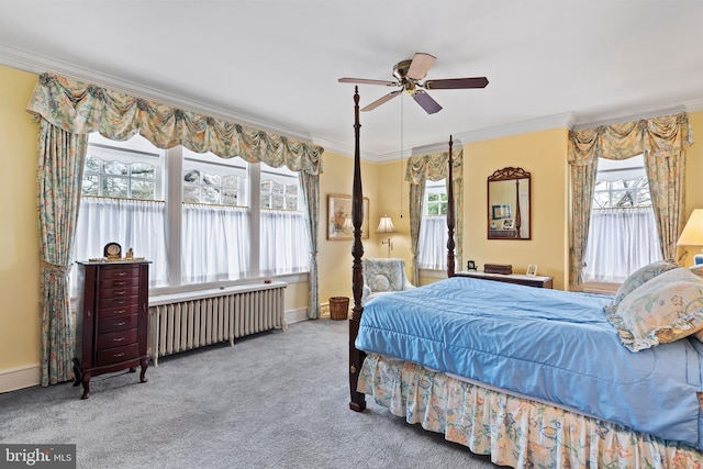 bedroom with carpet floors, ornamental molding, radiator, and multiple windows