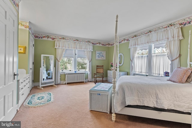 carpeted bedroom featuring radiator heating unit