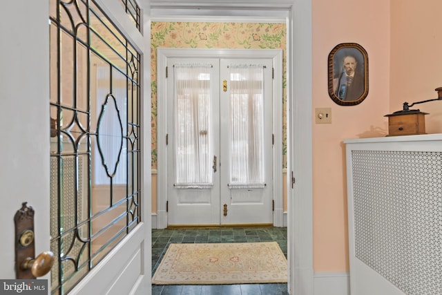 foyer featuring french doors