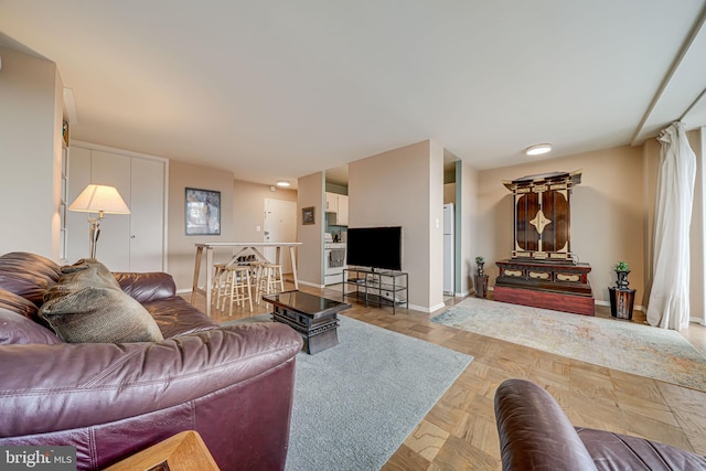 living room with light parquet flooring