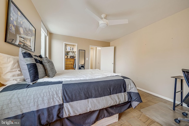 bedroom featuring parquet floors and ceiling fan