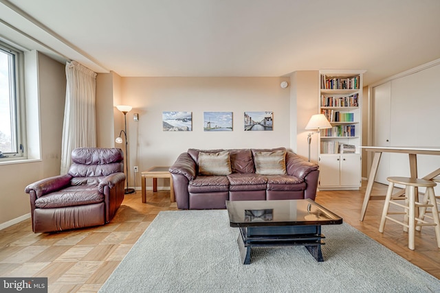 living room featuring light parquet floors