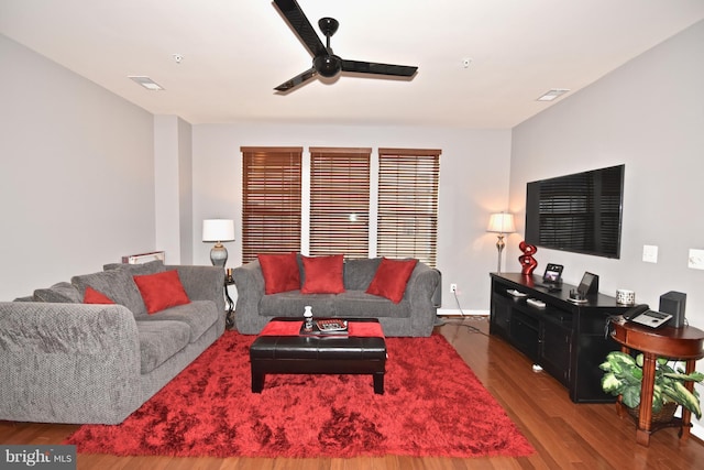 living room with hardwood / wood-style floors and ceiling fan