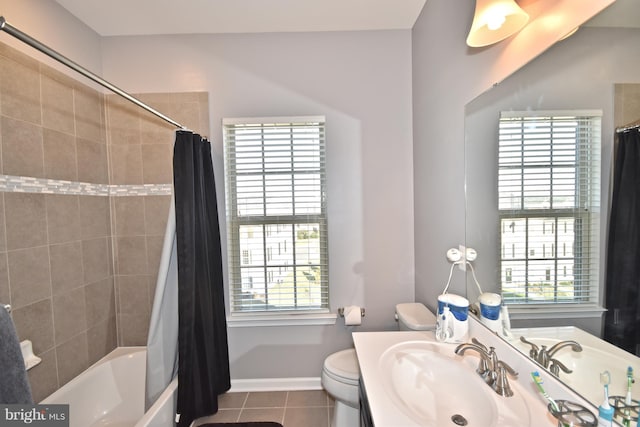 full bathroom featuring shower / tub combo, a wealth of natural light, tile patterned floors, and toilet