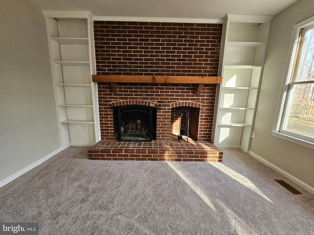 unfurnished living room featuring a fireplace and carpet