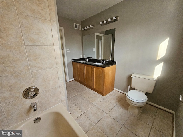 full bathroom featuring vanity, tile patterned floors, toilet, and shower / bath combination