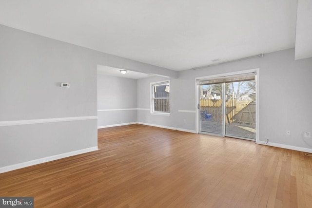 unfurnished room with light hardwood / wood-style flooring