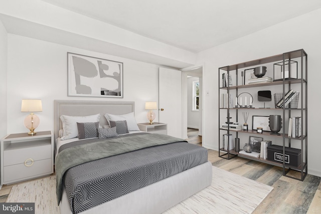 bedroom featuring hardwood / wood-style flooring