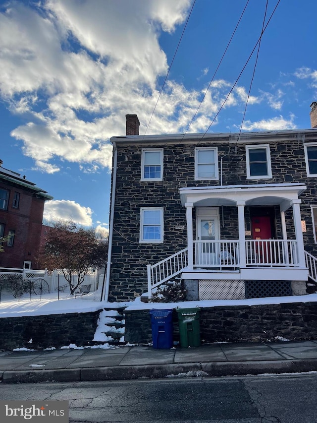 view of front of home featuring covered porch