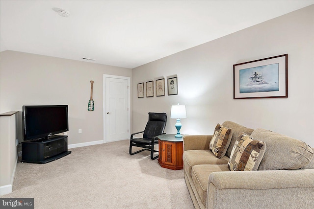 living room featuring light carpet and vaulted ceiling