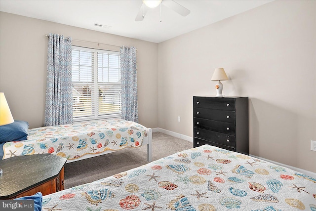 bedroom with ceiling fan and carpet flooring