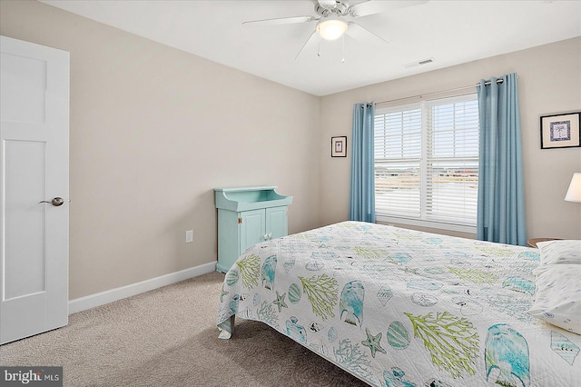 bedroom featuring light carpet and ceiling fan