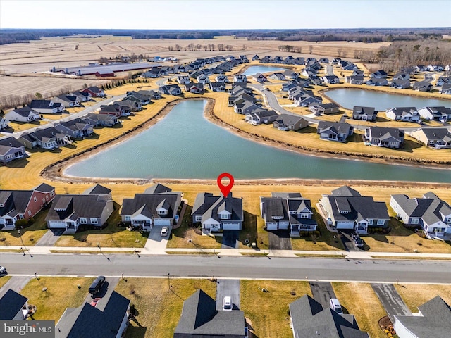 drone / aerial view featuring a water view