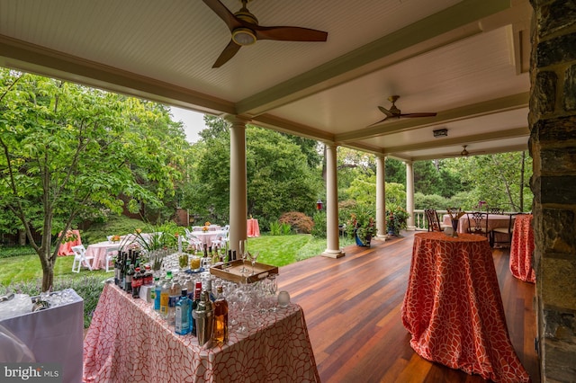 wooden terrace with ceiling fan