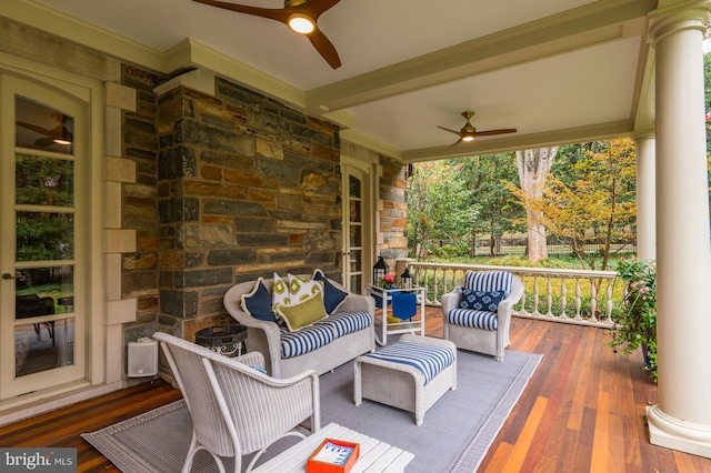 deck featuring a porch and a ceiling fan