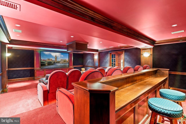 home theater with recessed lighting, carpet flooring, visible vents, and crown molding